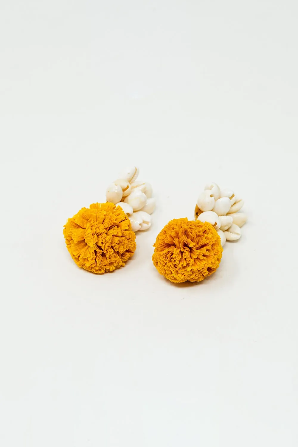 Earrings With Cream Seashells and Yellow Pom Poms