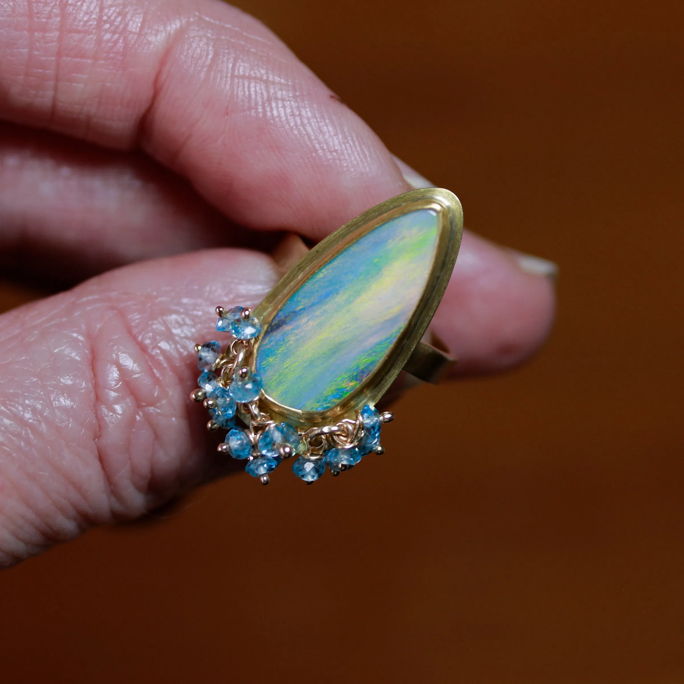 Green Flash Opal and London Blue Topaz Fringe Ring. Size 7 1/2.
