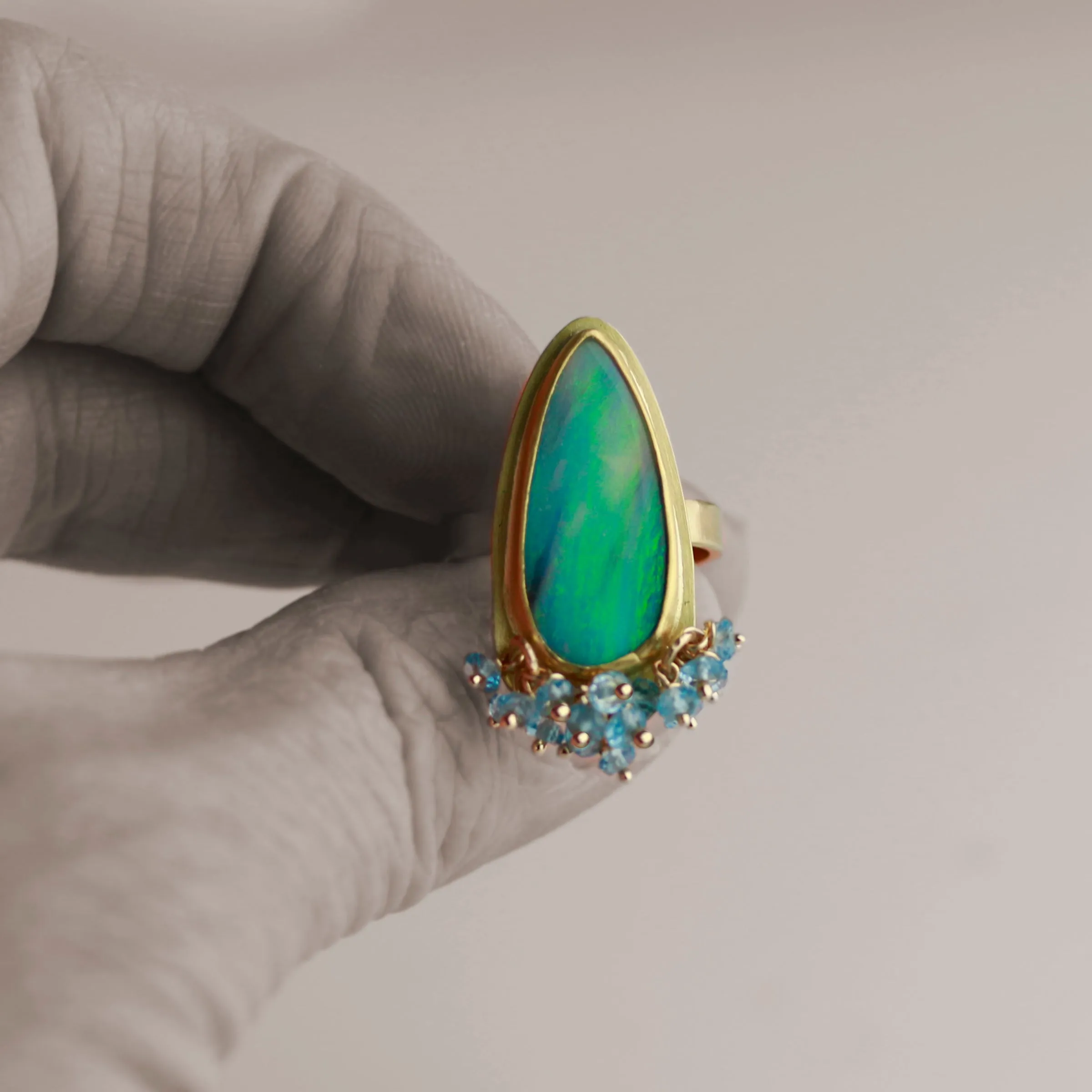 Green Flash Opal and London Blue Topaz Fringe Ring. Size 7 1/2.