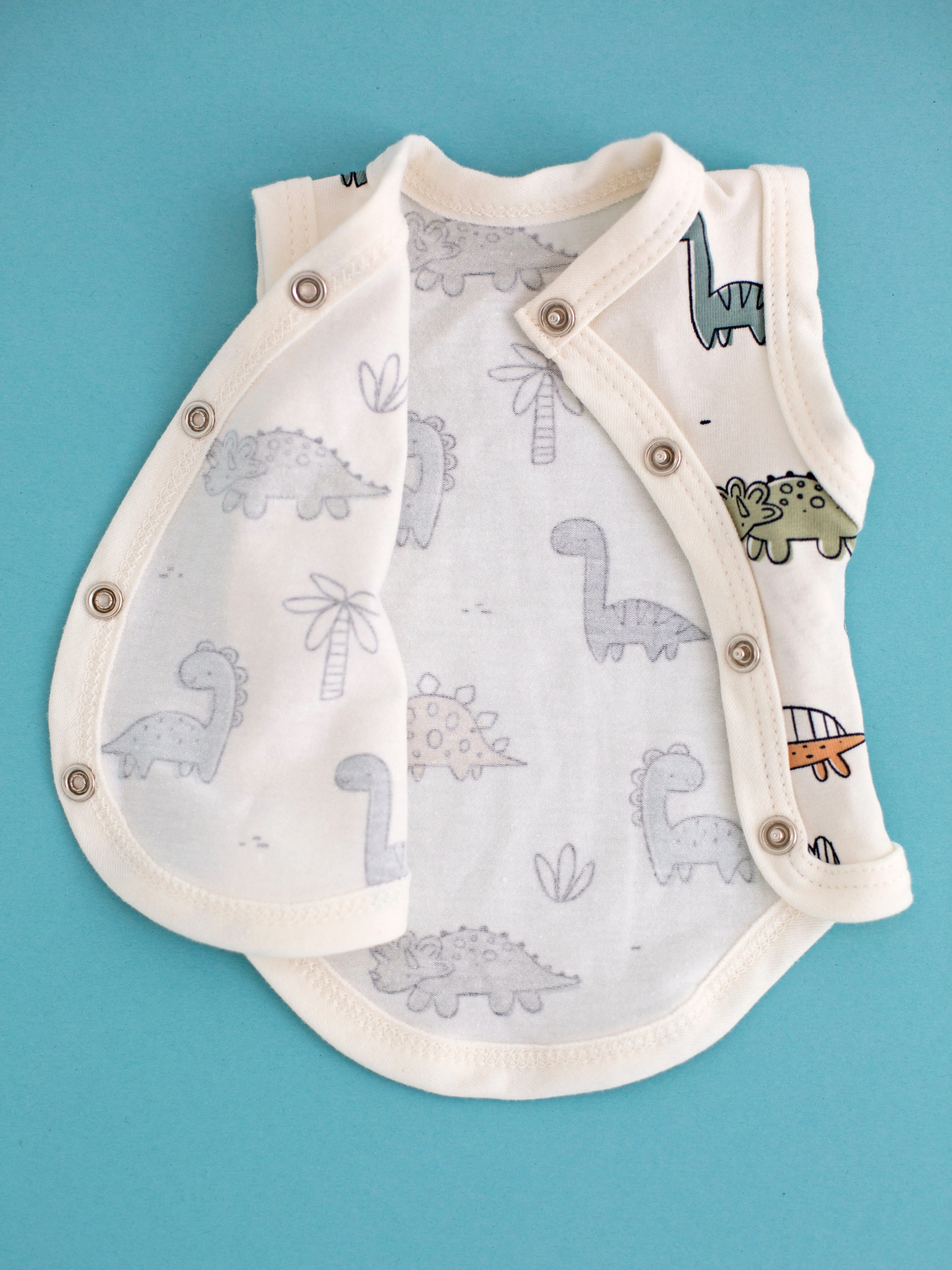 Incubator Vest, Cream Dino Buddies