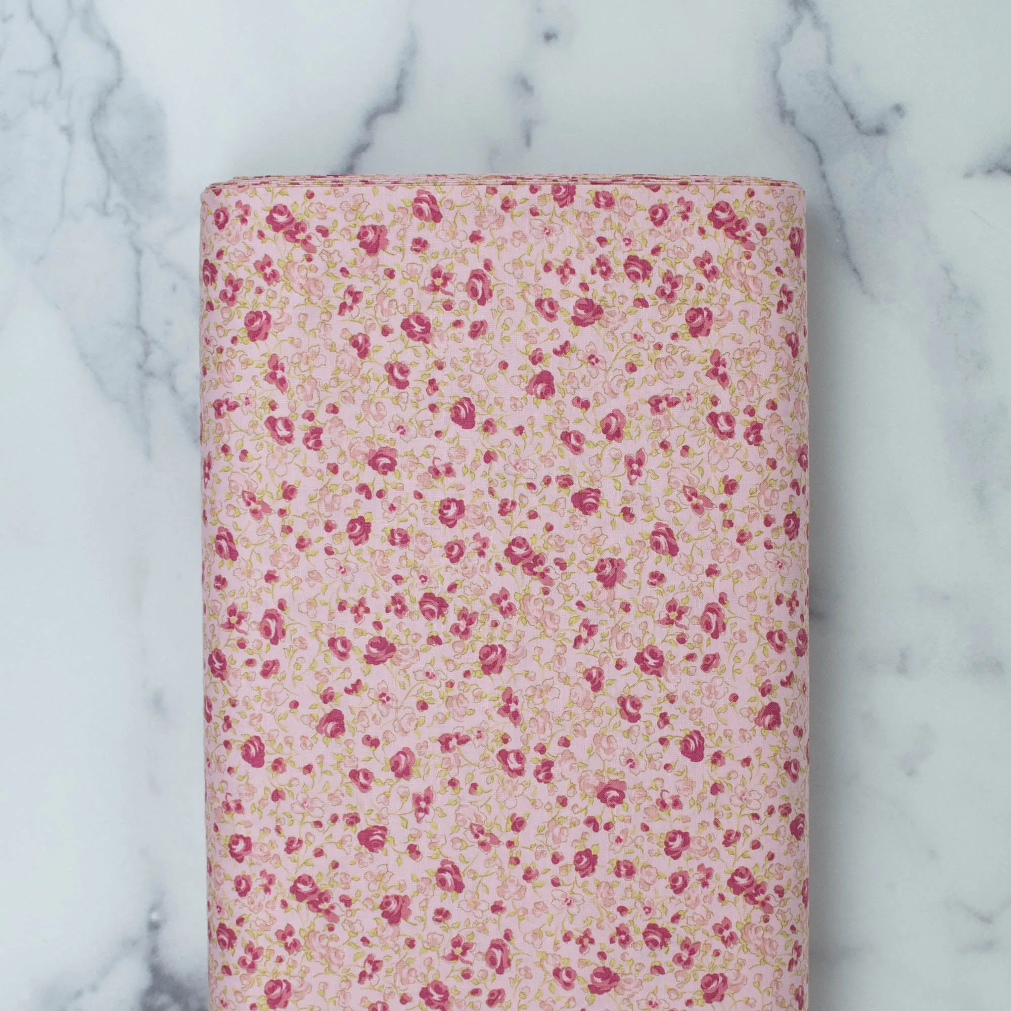 Madeline - Small roses on pink background