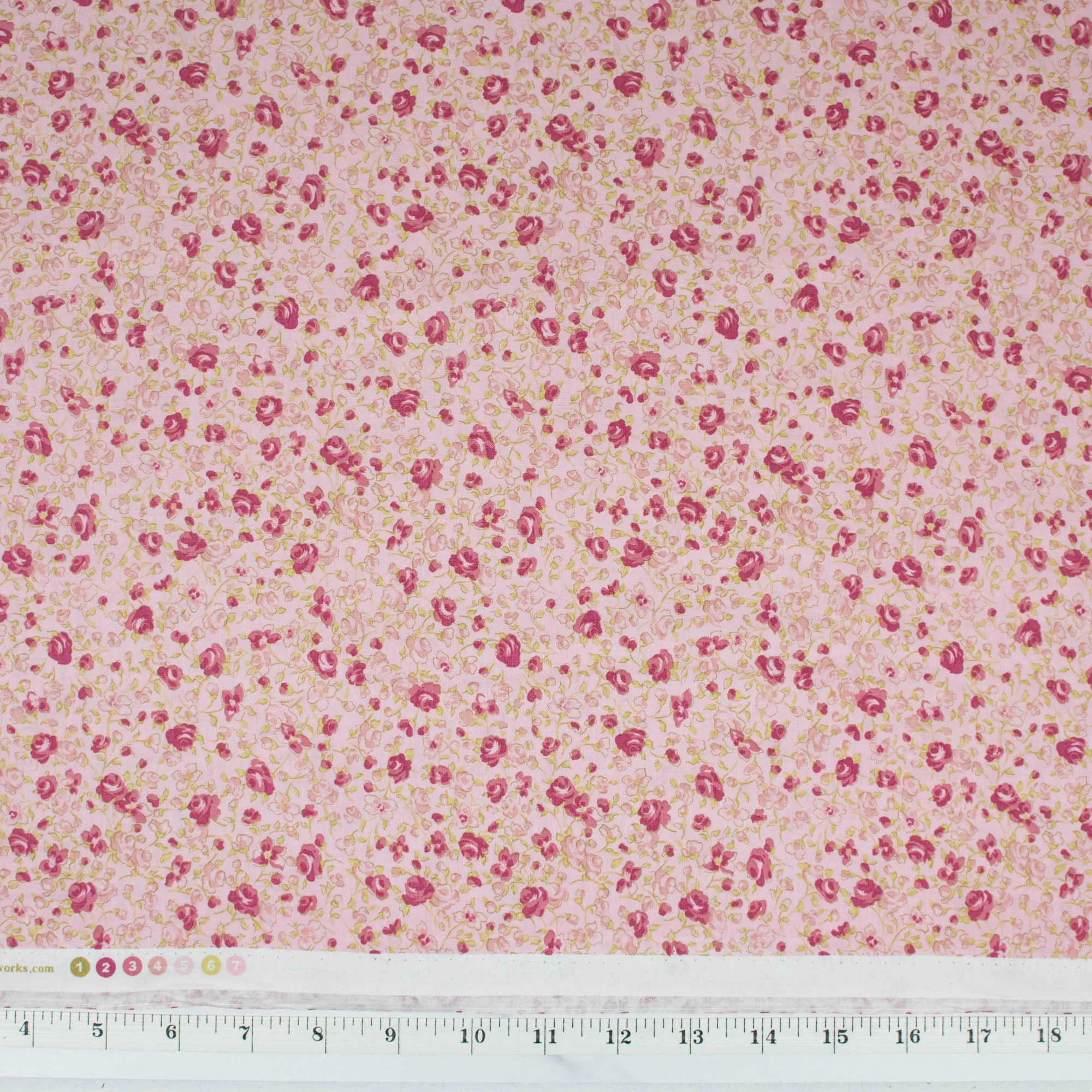 Madeline - Small roses on pink background