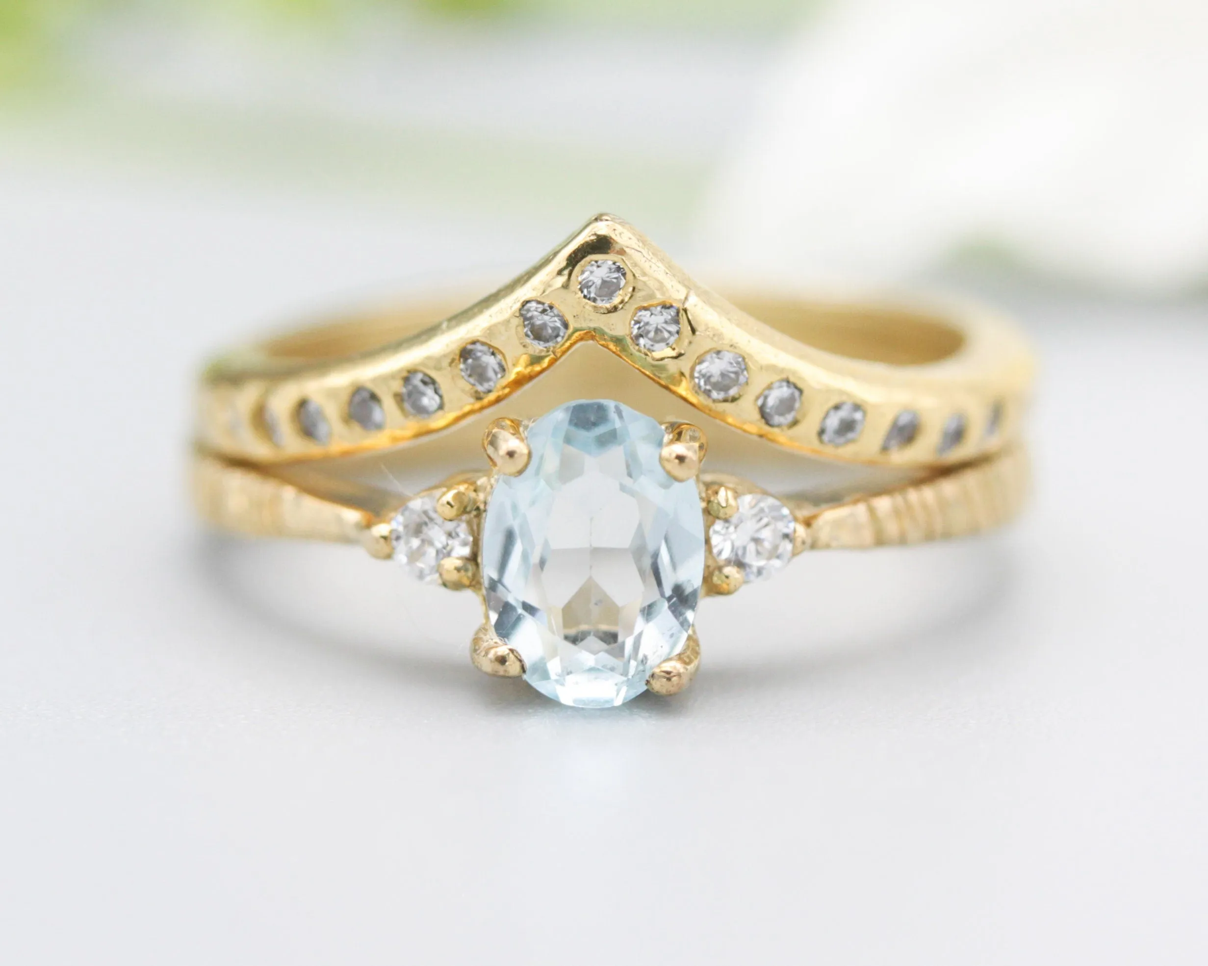 Set of 2 Oval Blue topaz ring and diamond side set in prongs setting with 14k gold band set with 14k gold band ring and tiny 15 diamond