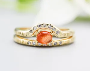 Set of 2 Oval cabochon Sunstone ring with tiny diamonds on 14k gold band set with 14k gold band ring with tiny 7 diamond on the center
