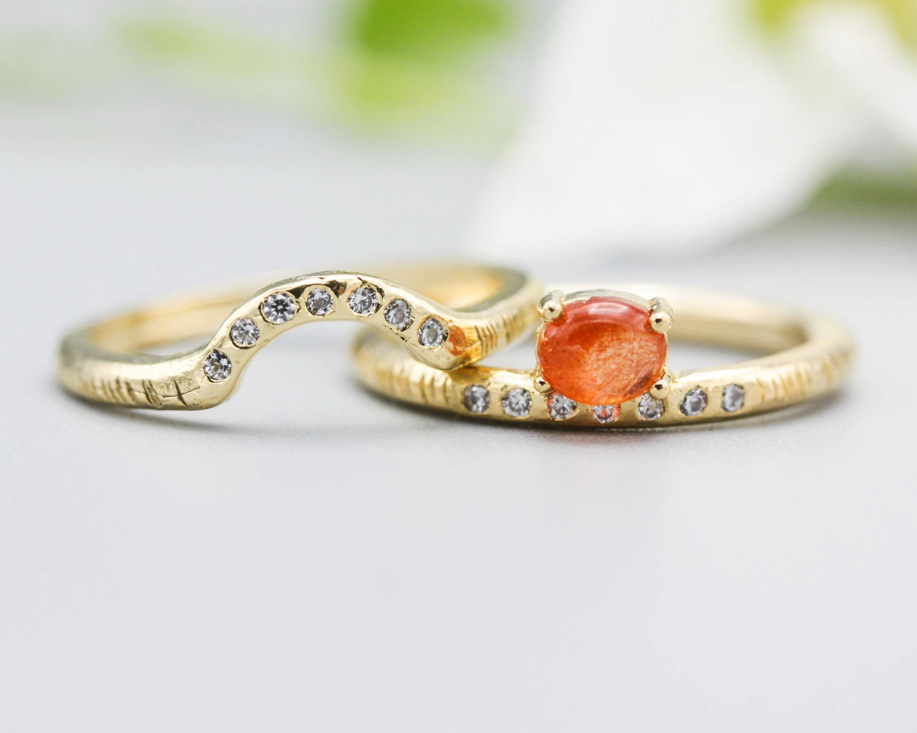 Set of 2 Oval cabochon Sunstone ring with tiny diamonds on 14k gold band set with 14k gold band ring with tiny 7 diamond on the center
