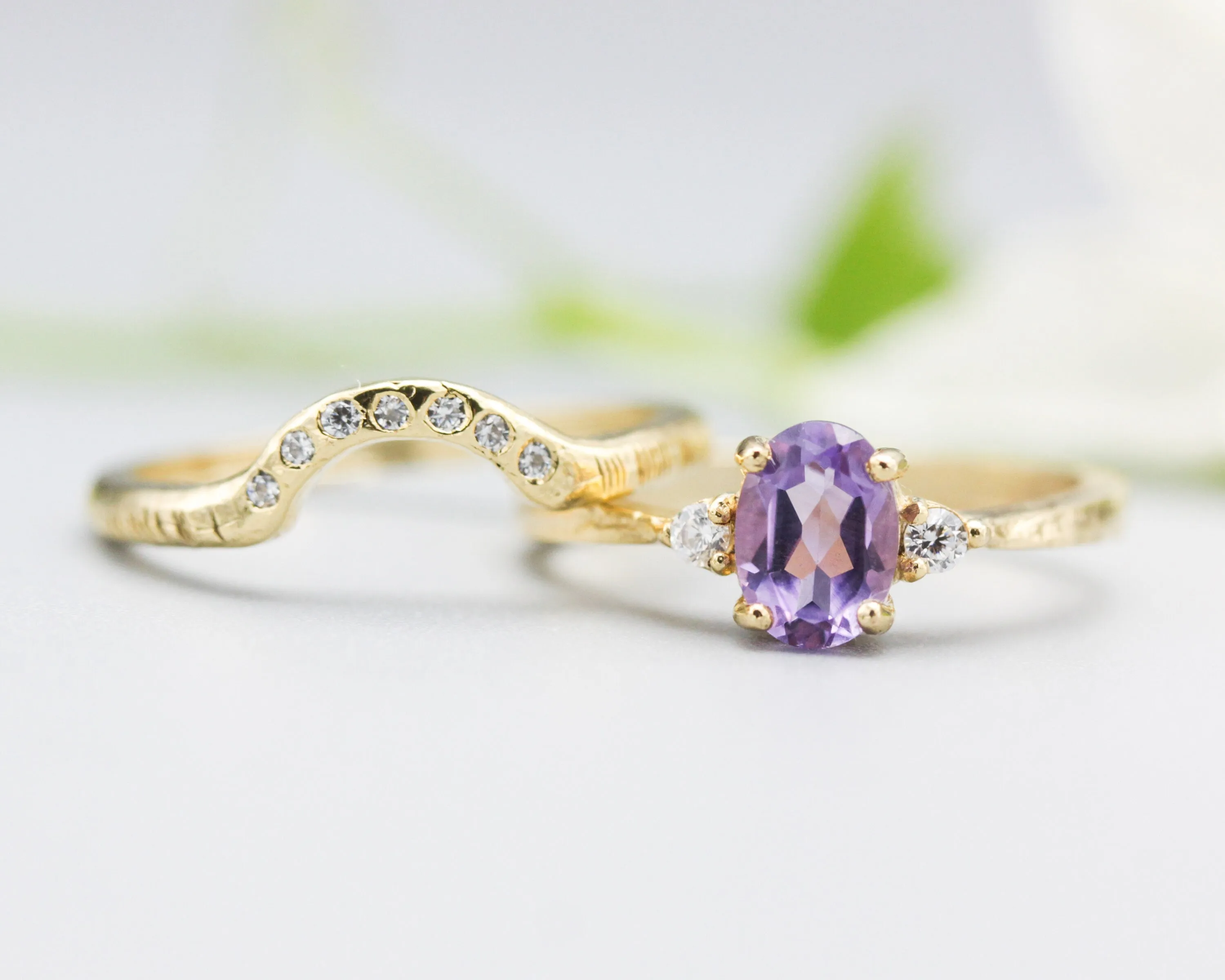 Set of 2 Oval faceted amethyst ring with tiny round diamonds side set with 14k gold band ring with tiny 7 diamond on the center