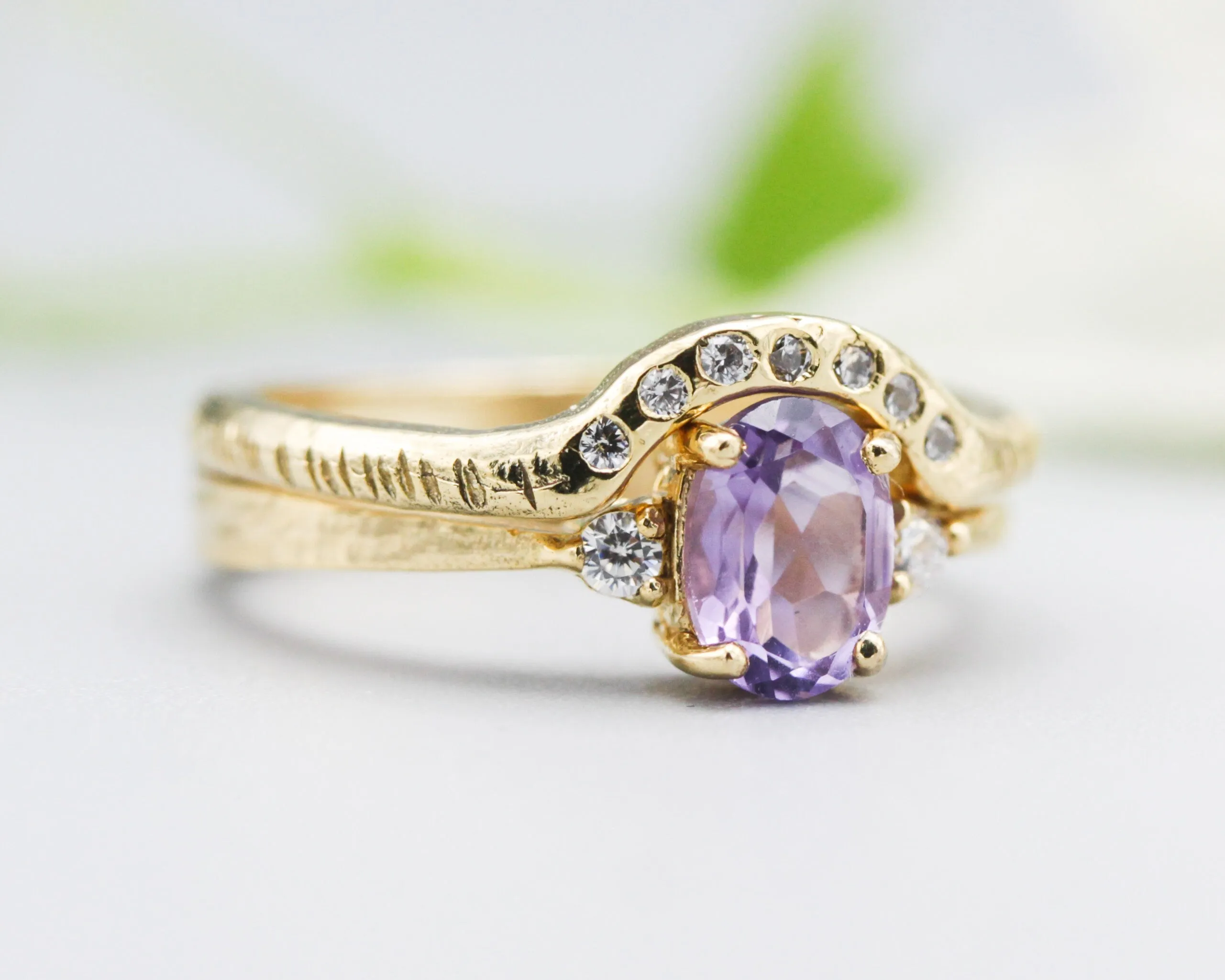 Set of 2 Oval faceted amethyst ring with tiny round diamonds side set with 14k gold band ring with tiny 7 diamond on the center