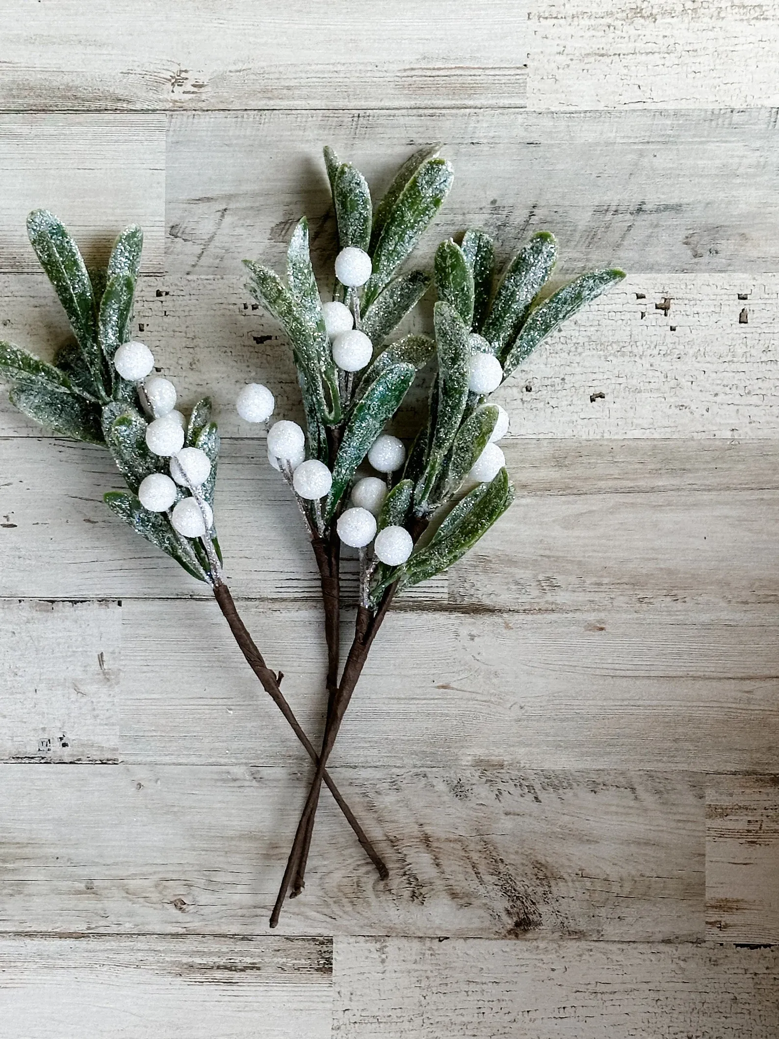 Set of frosted mistletoe greenery picks
