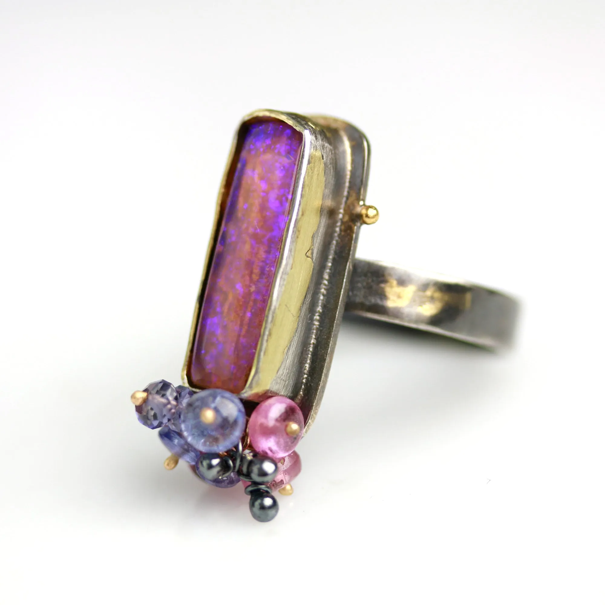 Sold. Australian Pipe Wood Fossil Opal with Ruby and Tanzanite Cluster Ring