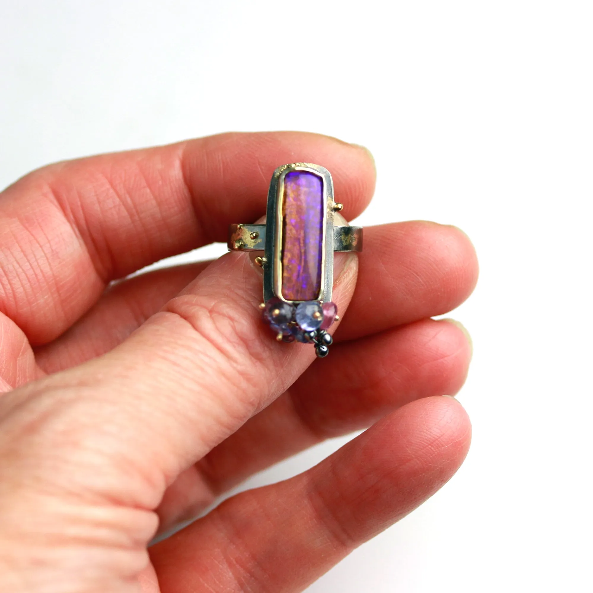 Sold. Australian Pipe Wood Fossil Opal with Ruby and Tanzanite Cluster Ring