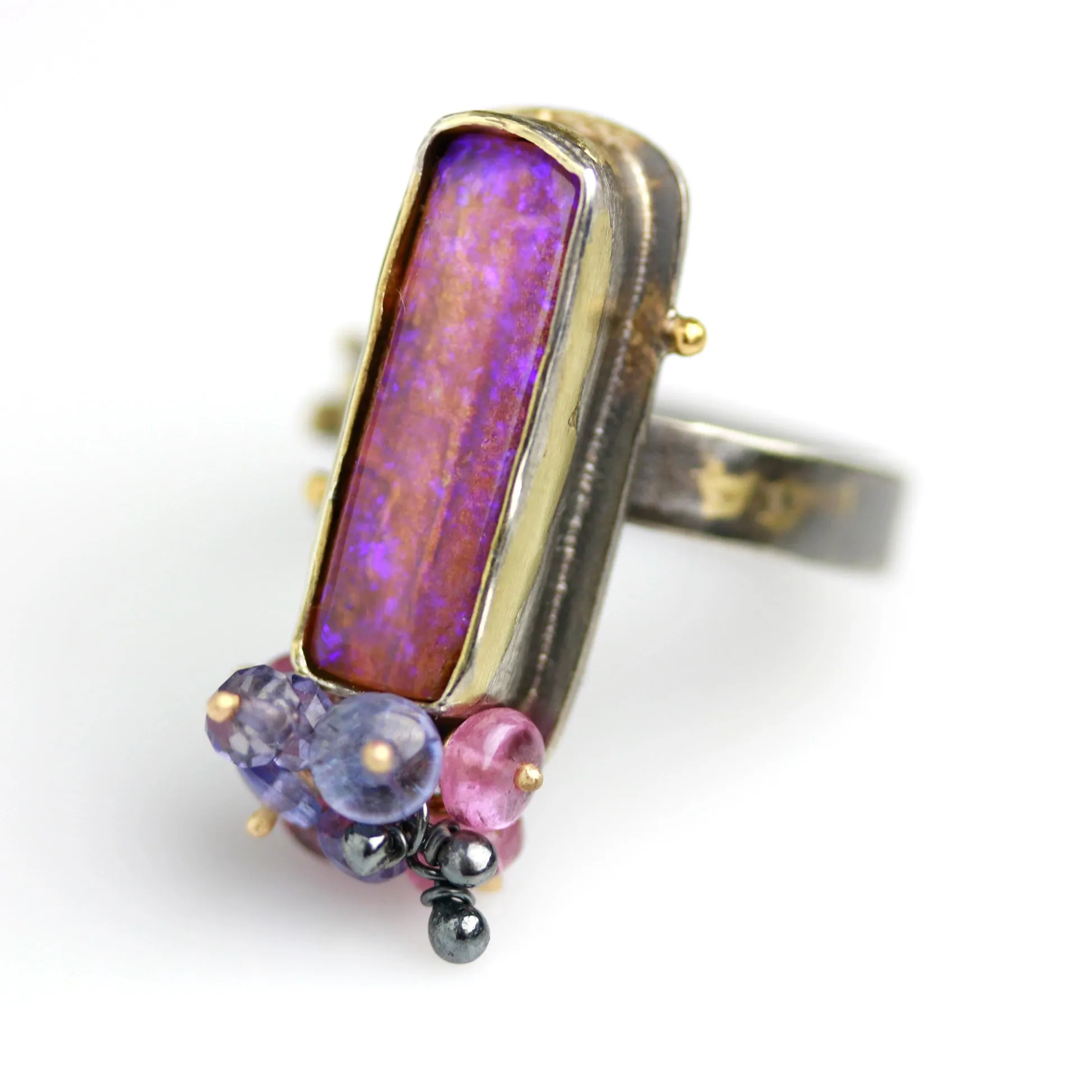 Sold. Australian Pipe Wood Fossil Opal with Ruby and Tanzanite Cluster Ring