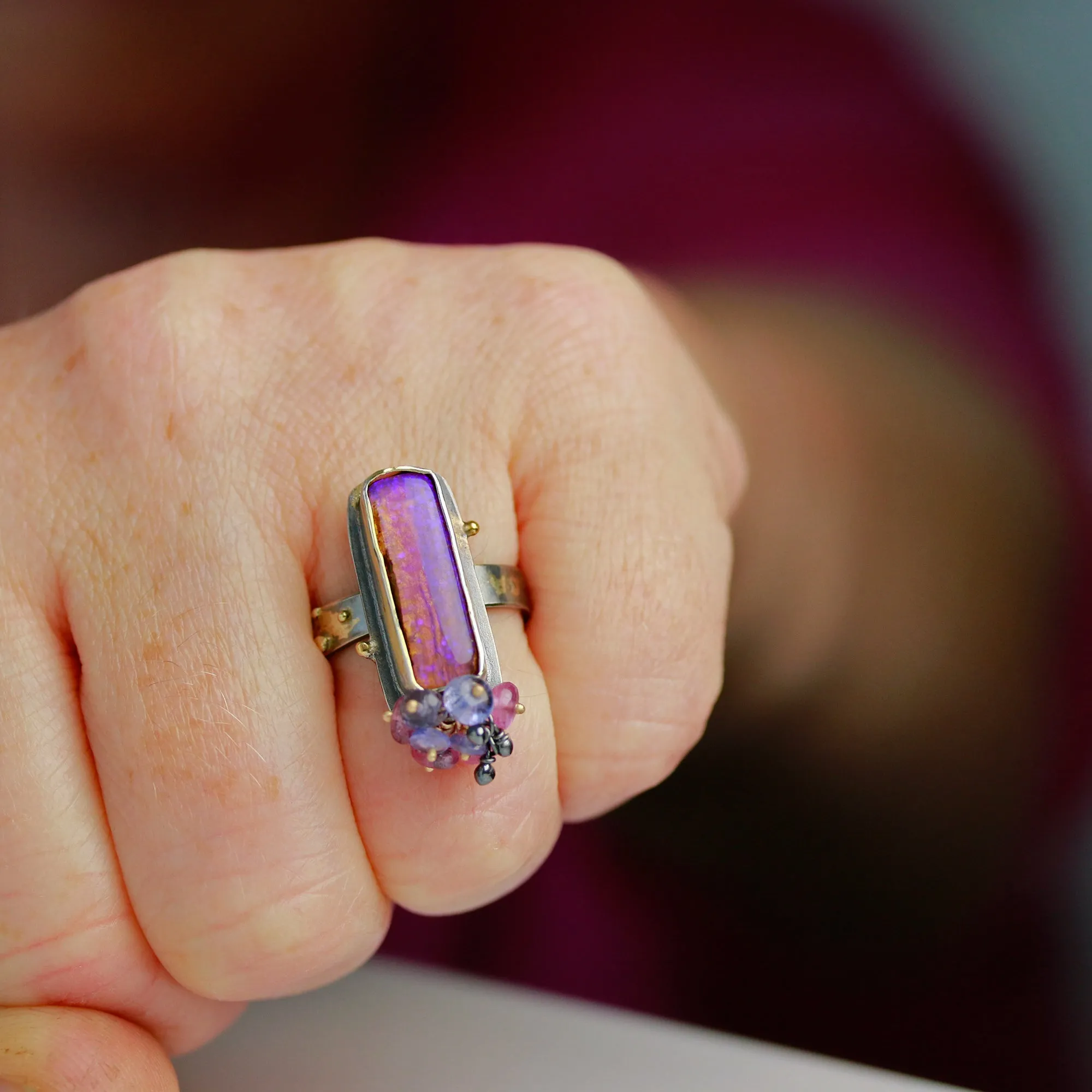 Sold. Australian Pipe Wood Fossil Opal with Ruby and Tanzanite Cluster Ring