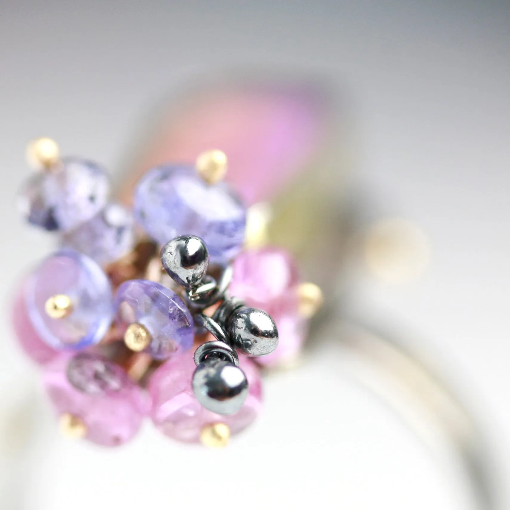 Sold. Australian Pipe Wood Fossil Opal with Ruby and Tanzanite Cluster Ring