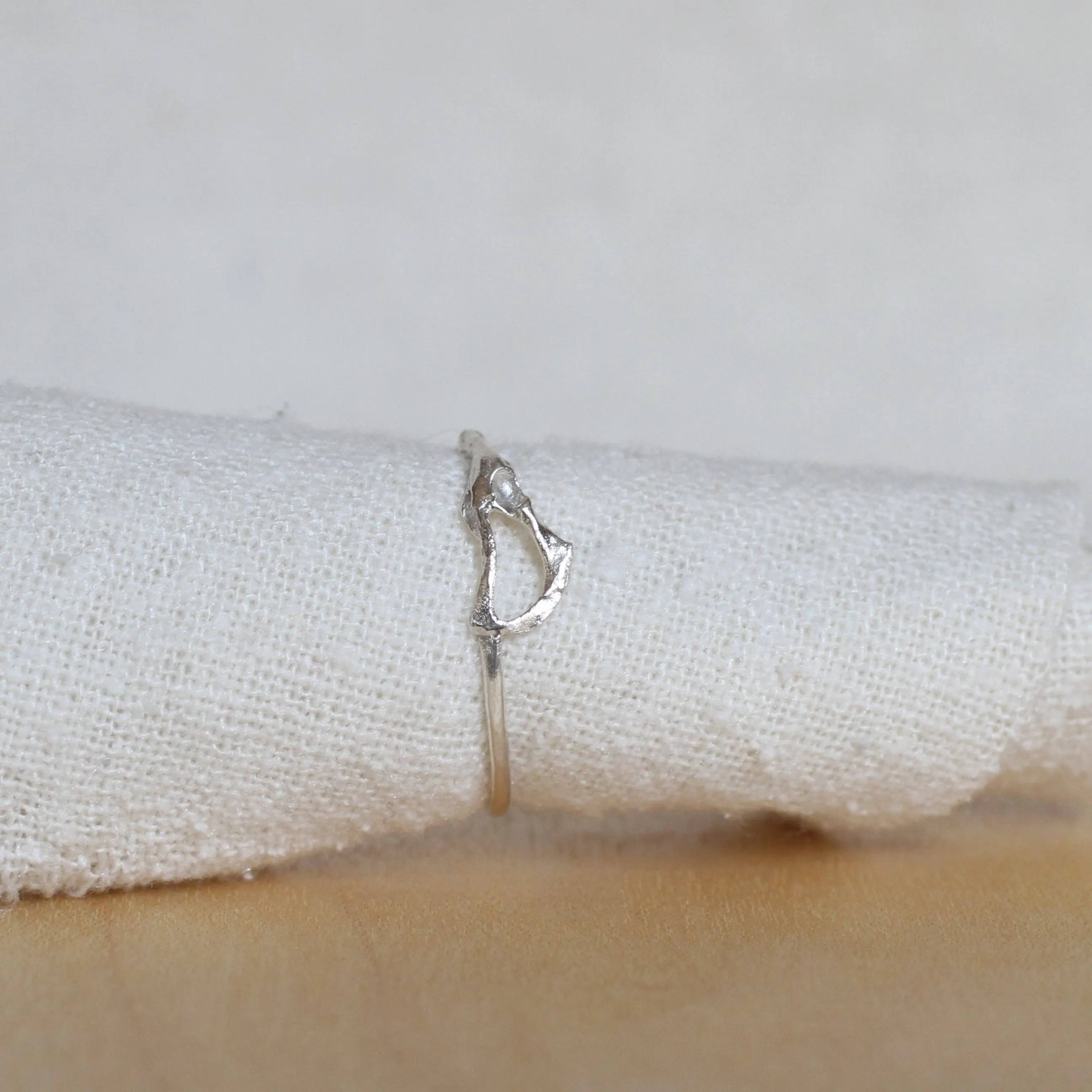 tiny bone ring