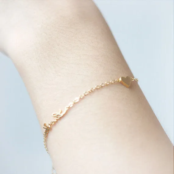 Tiny heart and Love You Bracelet in gold