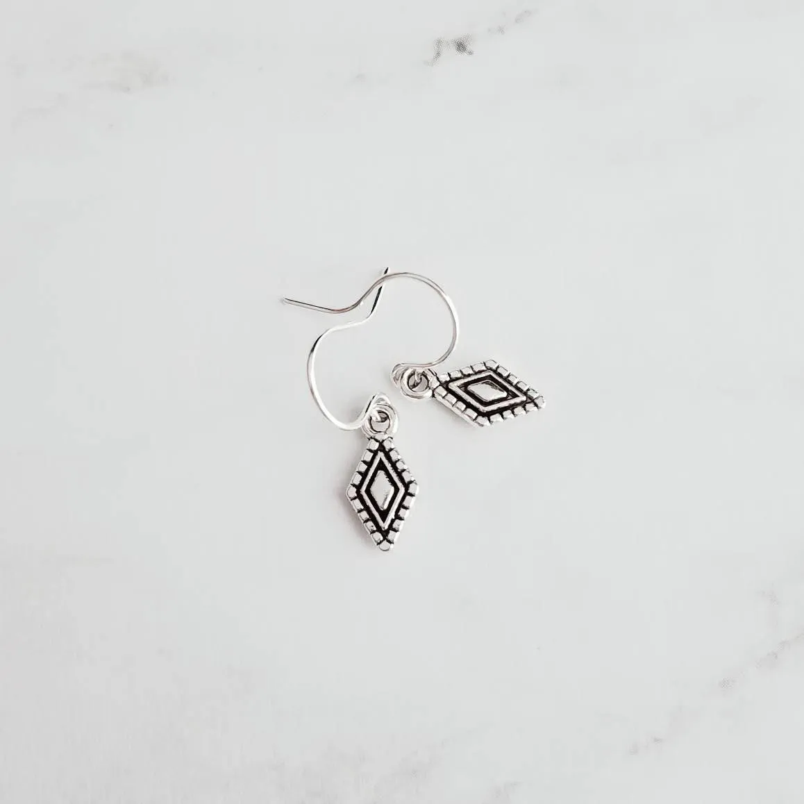 Tiny Silver Diamond Shape Earrings on small simple hooks - raised design oxidized/antique finish rhombus charm - math geometric shape