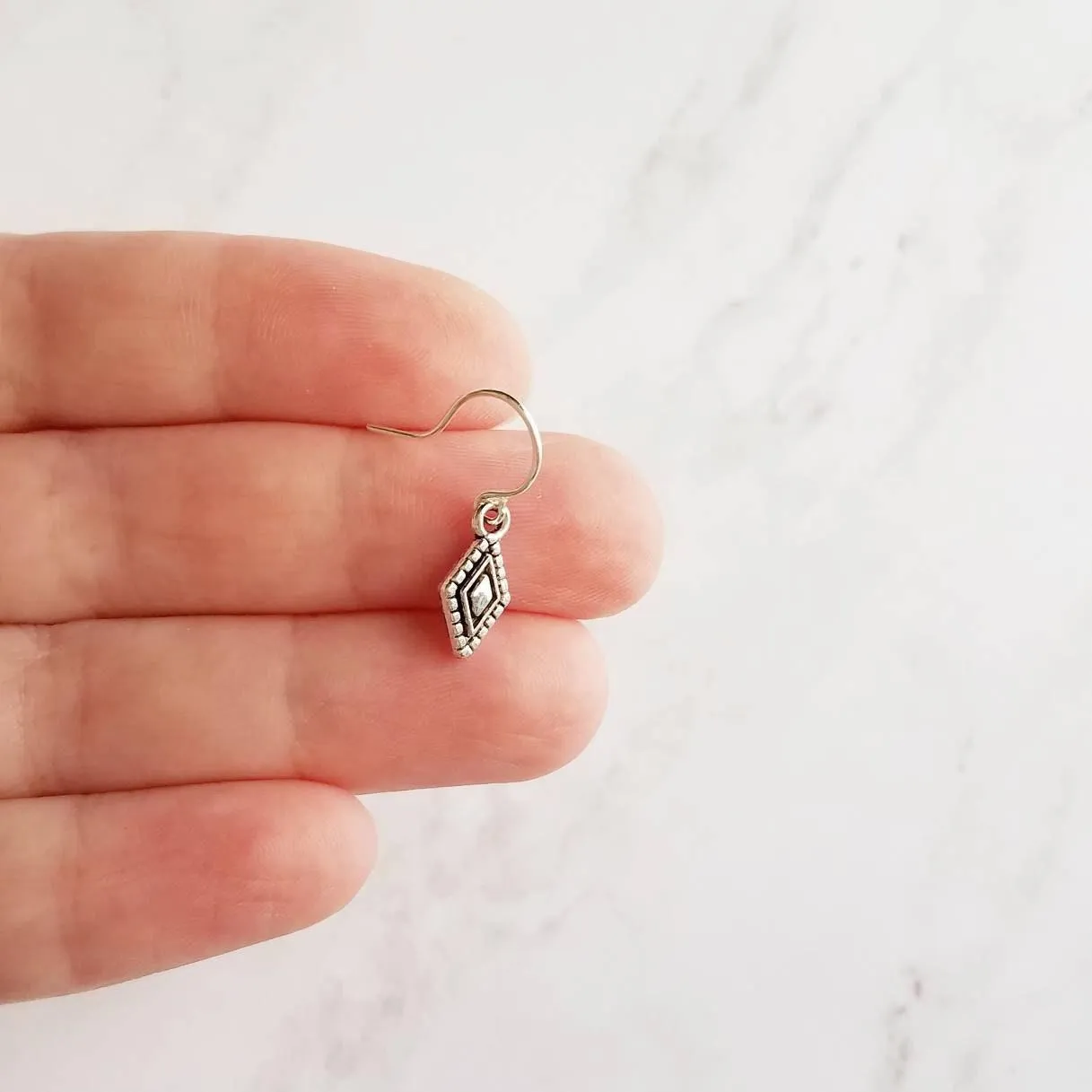 Tiny Silver Diamond Shape Earrings on small simple hooks - raised design oxidized/antique finish rhombus charm - math geometric shape